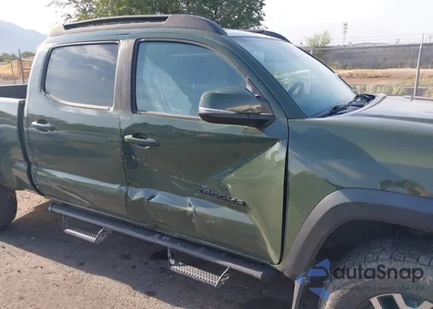 2021 Toyota Tacoma Trd Off-Road z USA, uszkodzony, nr VIN 3TMDZ5BN4MM120383